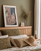 Children With American Flag by Wild Apple Portfolio. shown as a paper print in a natural frame. Available as a archival giclee rolled canvas, fine art paper, or poster print. SKU 99050h.