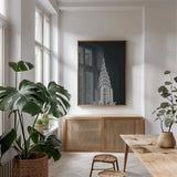 Chrysler Building on Black by Wild Apple Portfolio. shown as a print in a natural wood frame in a dining room. Available as a archival giclee rolled canvas, fine art paper, or poster print. SKU 68472h.