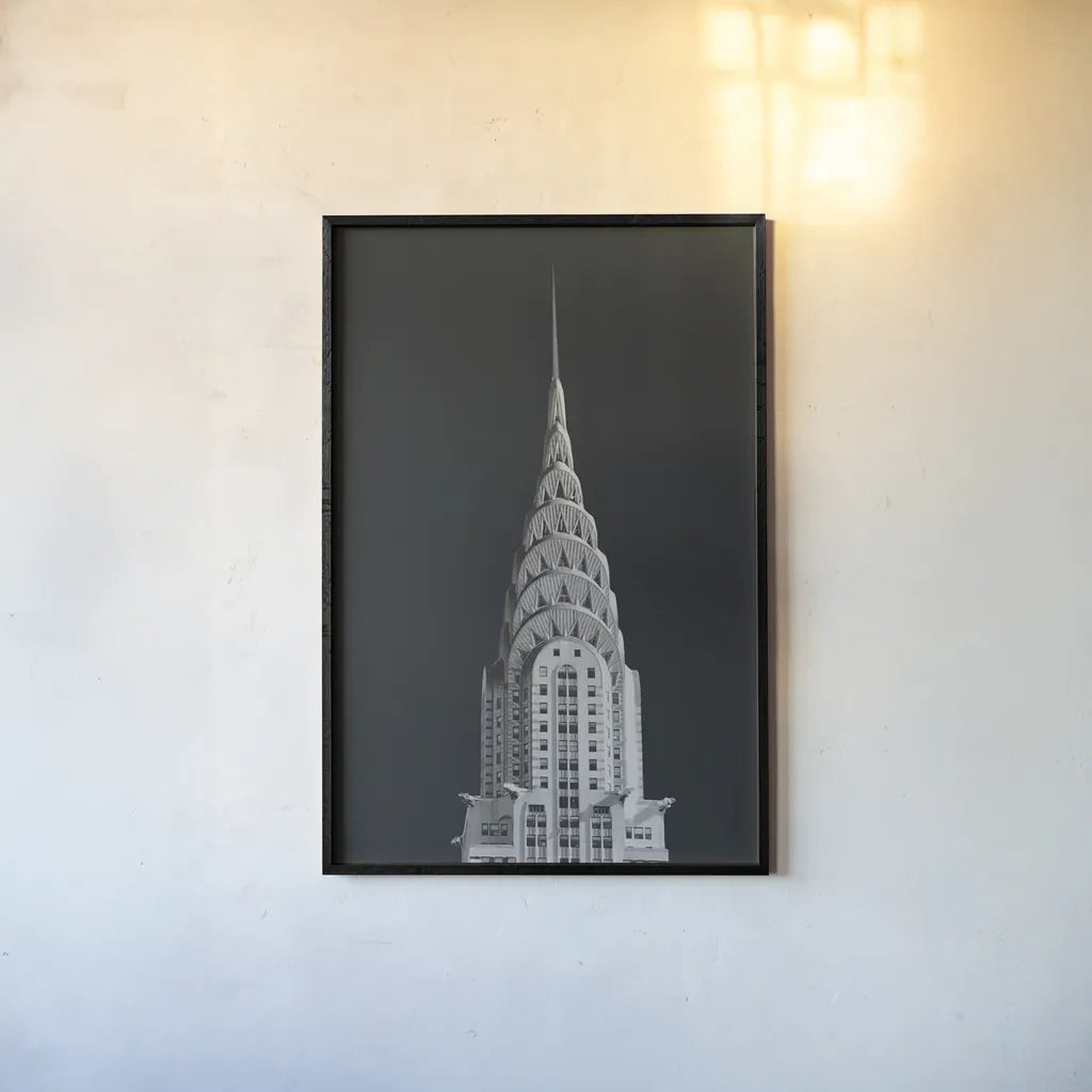 Chrysler Building on Black by Wild Apple Portfolio. shown as a paper print in a black flame. Available as a archival giclee rolled canvas, fine art paper, or poster print. SKU 68472h.