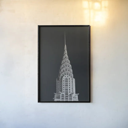 Chrysler Building on Black by Wild Apple Portfolio. shown as a paper print in a black flame. Available as a archival giclee rolled canvas, fine art paper, or poster print. SKU 68472h.