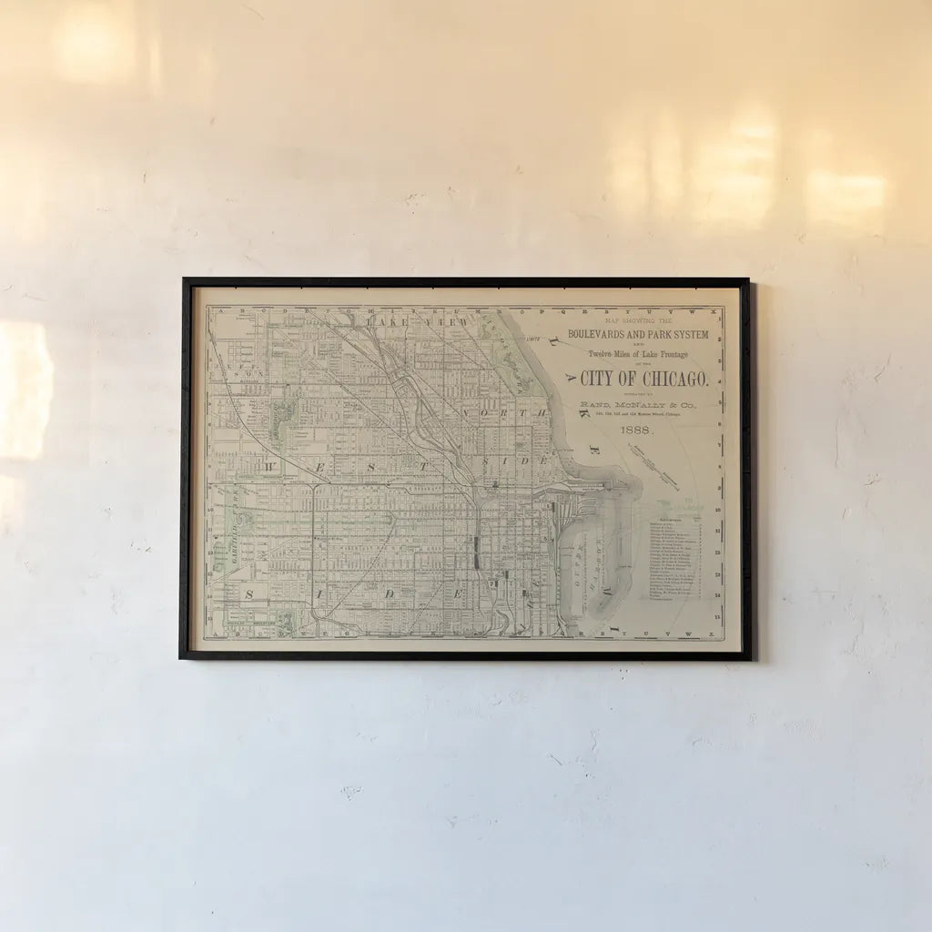 City of Chicago Map 1888 v2 by Wild Apple Portfolio. shown as a paper print in a black flame. Available as a archival giclee rolled canvas, fine art paper, or poster print. SKU 95495i.