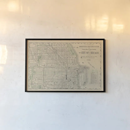 City of Chicago Map 1888 v2 by Wild Apple Portfolio. shown as a paper print in a black flame. Available as a archival giclee rolled canvas, fine art paper, or poster print. SKU 95495i.