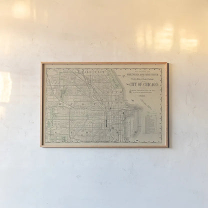 City of Chicago Map 1888 v2 by Wild Apple Portfolio. shown as a paper print in a natural frame. Available as a archival giclee rolled canvas, fine art paper, or poster print. SKU 95495i.
