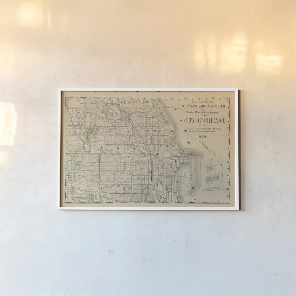 City of Chicago Map 1888 v2 by Wild Apple Portfolio. shown as a paper print in a white frame. Available as a archival giclee rolled canvas, fine art paper, or poster print. SKU 95495i.