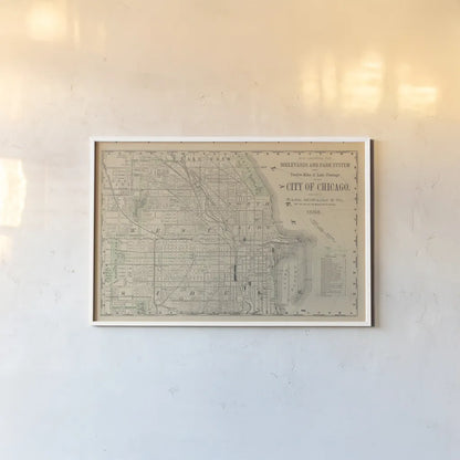 City of Chicago Map 1888 v2 by Wild Apple Portfolio. shown as a paper print in a white frame. Available as a archival giclee rolled canvas, fine art paper, or poster print. SKU 95495i.