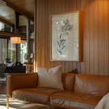 Conversations on  Botany 06 by Wild Apple Portfolio. shown in a modern house on wood wall paneling in a natural wood frame above a leather couch. Available as an archival giclee rolled canvas, fine art paper, or poster print. SKU 39019h.