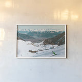 Downhill Skiing by Wild Apple Portfolio. shown as a paper print in a white frame. Available as a archival giclee rolled canvas, fine art paper, or poster print. SKU 104287i.