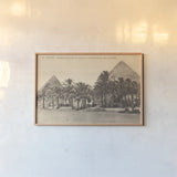 Egypt Postcard II by Wild Apple Portfolio. shown as a paper print in a natural frame. Available as a archival giclee rolled canvas, fine art paper, or poster print. SKU 71179i.