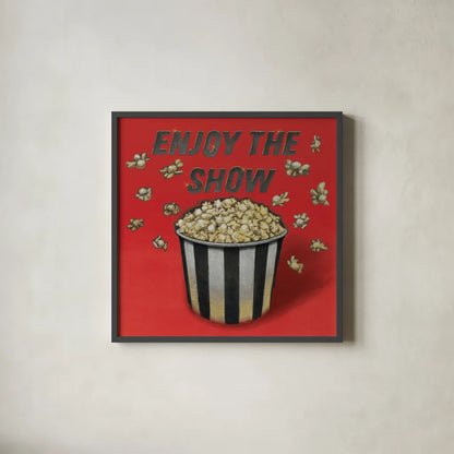Enjoy the Show Red by Wild Apple Portfolio. Shown in a sleek black glass frame for a contemporary gallery look. Available as an archival giclee rolled canvas, fine art paper, or poster print. SKU 52831a.