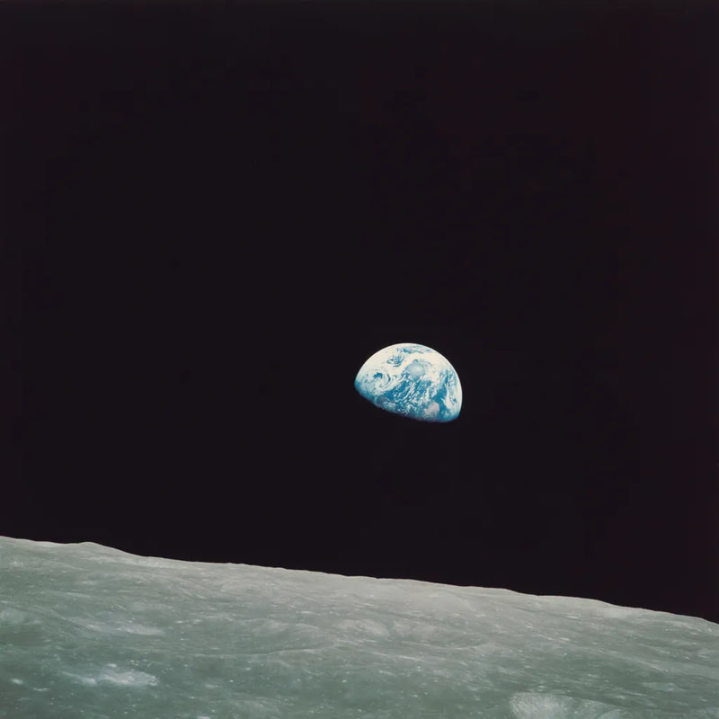 First Earth Rise by Wild Apple Portfolio. SKU 84536a. Archival Giclee Fine art print for wall decor.