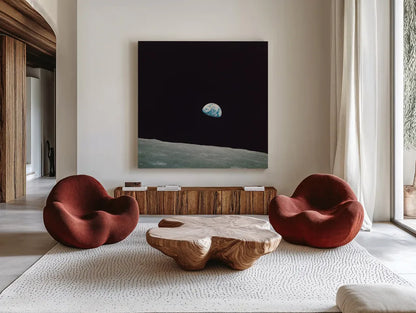 First Earth Rise by Wild Apple Portfolio. Shown as extra-large giant wall art in a modern living room. Available as an archival giclee rolled canvas, fine art paper, or poster print. SKU 84536a.
