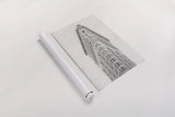 Flatiron Building NYC by Wild Apple Portfolio. shown as a rolled paper print. Available as archival giclee rolled canvas, fine art paper, or poster print. SKU 67632h.