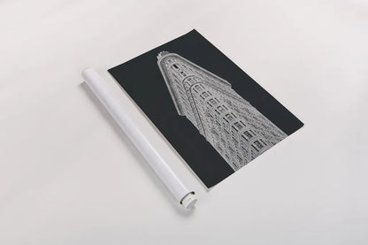 Flatiron Building on Black by Wild Apple Portfolio. shown as a rolled paper print. Available as archival giclee rolled canvas, fine art paper, or poster print. SKU 68473h.