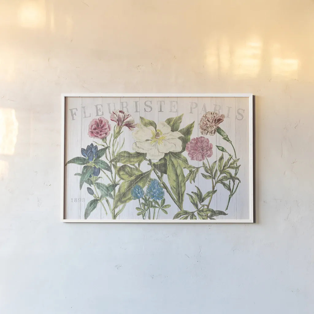 Fleuriste Paris I by Wild Apple Portfolio. shown as a paper print in a white frame. Available as a archival giclee rolled canvas, fine art paper, or poster print. SKU 43574i.