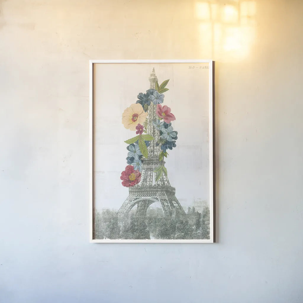 Floral Eiffel Tower by Wild Apple Portfolio. shown as a paper print in a white frame. Available as a archival giclee rolled canvas, fine art paper, or poster print. SKU 46628h.