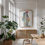 Floral Flat Iron by Wild Apple Portfolio. shown as a print in a natural wood frame in a dining room. Available as a archival giclee rolled canvas, fine art paper, or poster print. SKU 46629h.