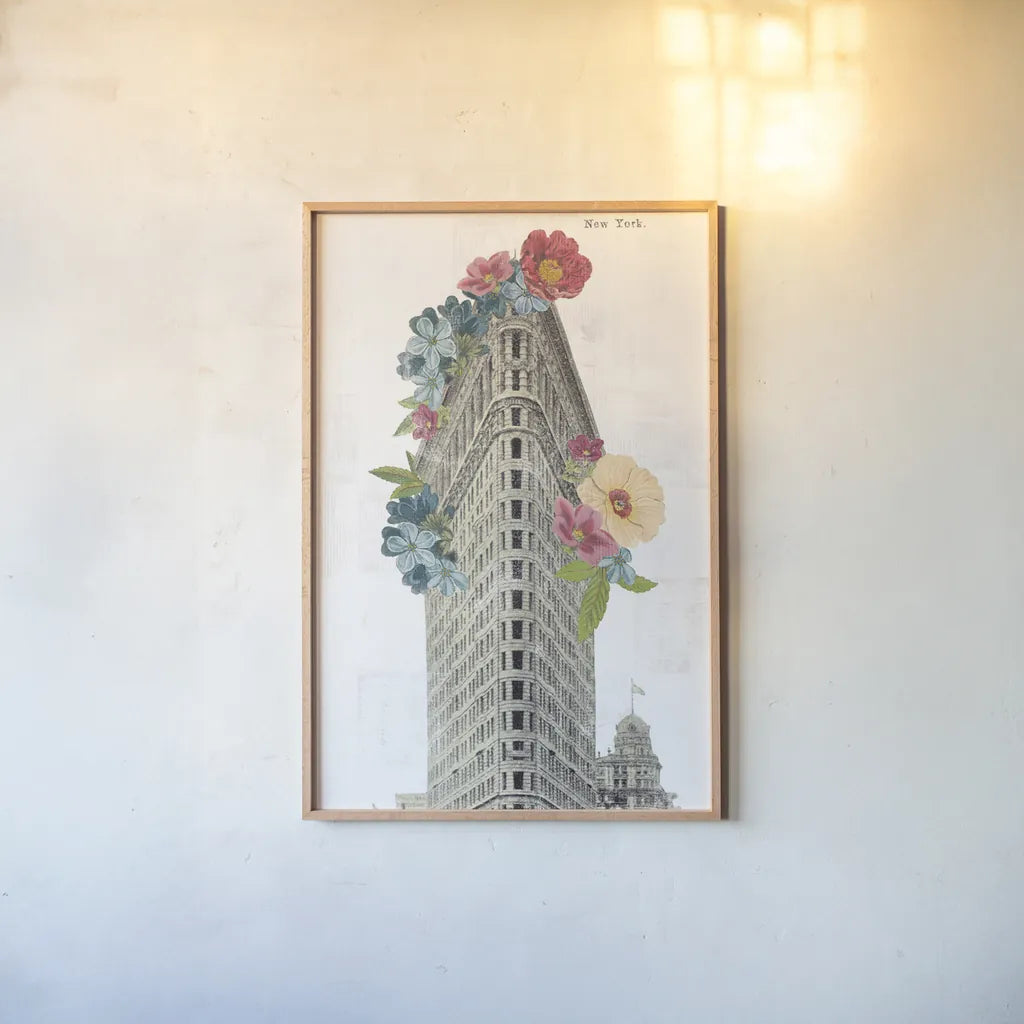 Floral Flat Iron by Wild Apple Portfolio. shown as a paper print in a natural frame. Available as a archival giclee rolled canvas, fine art paper, or poster print. SKU 46629h.