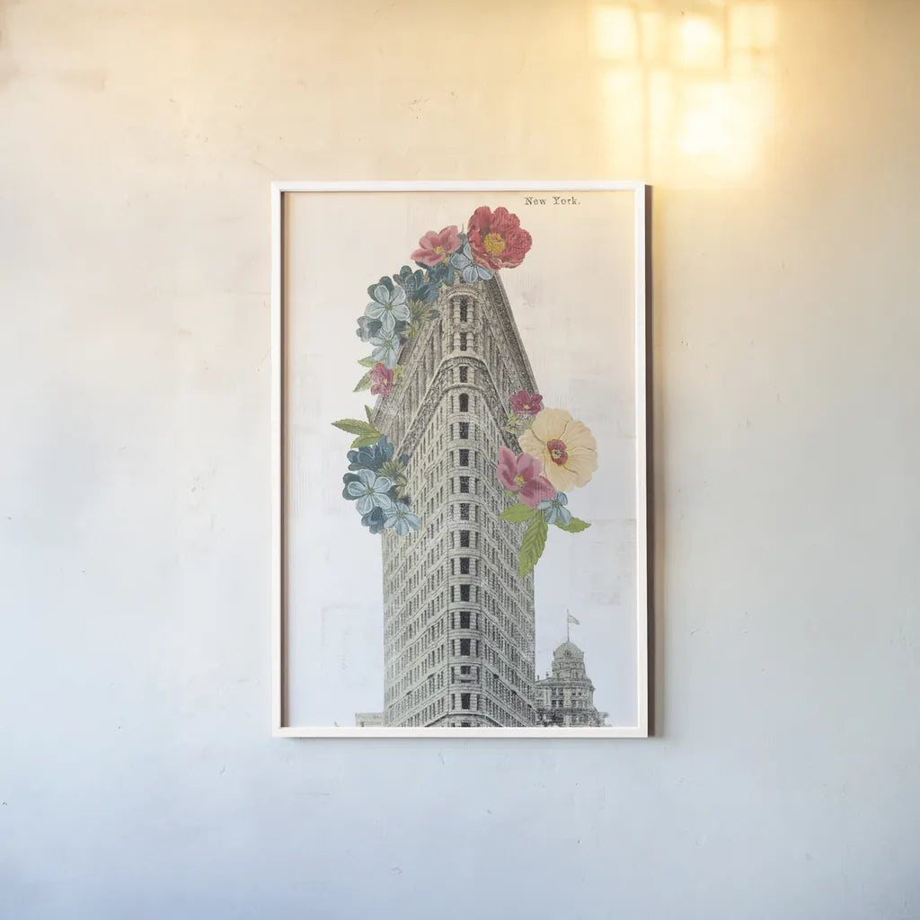 Floral Flat Iron by Wild Apple Portfolio. shown as a paper print in a white frame. Available as a archival giclee rolled canvas, fine art paper, or poster print. SKU 46629h.
