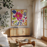 Floral Medley I by Wild Apple Portfolio. Shown in a natural wood frame in a cozy modern living room. Available as an archival giclee rolled canvas, fine art paper, or poster print. SKU 13208a.