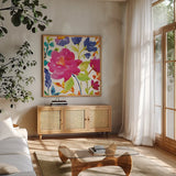 Floral Medley II by Wild Apple Portfolio. Shown in a natural wood frame in a cozy modern living room. Available as an archival giclee rolled canvas, fine art paper, or poster print. SKU 13209a.
