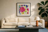 Floral Medley II by Wild Apple Portfolio. Displayed in a glass frame with matte in a clean modern living room. Available as an archival giclee rolled canvas, fine art paper, or poster print. SKU 13209a.