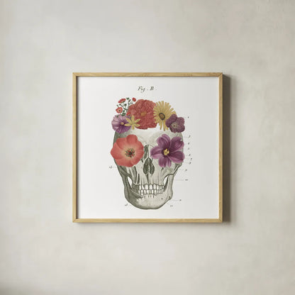 Floral Skull II by Wild Apple Portfolio. Shown in a natural wood glass frame for a timeless modern aesthetic. Available as an archival giclee rolled canvas, fine art paper, or poster print. SKU 37402a.
