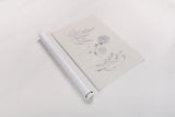 Flowers on White VIII Blue by Wild Apple Portfolio. shown as a rolled paper print. Available as archival giclee rolled canvas, fine art paper, or poster print. SKU 78211i.