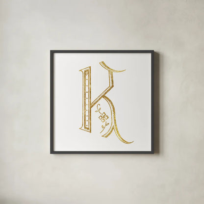 French Sewing Letter K by Wild Apple Portfolio. Shown in a sleek black glass frame for a contemporary gallery look. Available as an archival giclee rolled canvas, fine art paper, or poster print. SKU 43230a.