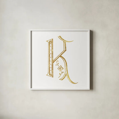 French Sewing Letter K by Wild Apple Portfolio. Shown in a crisp white glass frame for a clean and minimalist style. Available as an archival giclee rolled canvas, fine art paper, or poster print. SKU 43230a.