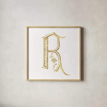 French Sewing Letter R by Wild Apple Portfolio. Shown in a natural wood glass frame for a timeless modern aesthetic. Available as an archival giclee rolled canvas, fine art paper, or poster print. SKU 43233a.