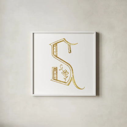 French Sewing Letter S by Wild Apple Portfolio. Shown in a crisp white glass frame for a clean and minimalist style. Available as an archival giclee rolled canvas, fine art paper, or poster print. SKU 43234a.