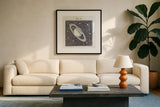Geography of the Heavens V by Wild Apple Portfolio. Displayed in a glass frame with matte in a clean modern living room. Available as an archival giclee rolled canvas, fine art paper, or poster print. SKU 42811a.