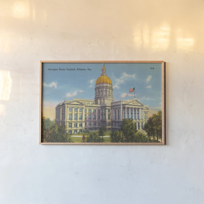 Georgia State Capitol Atlanta by Wild Apple Portfolio. shown as a paper print in a natural frame. Available as a archival giclee rolled canvas, fine art paper, or poster print. SKU 101642i.