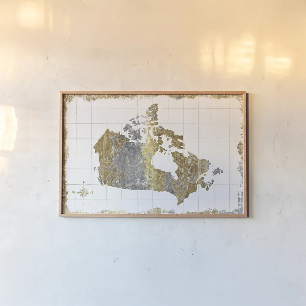 Gilded Map Canada by Wild Apple Portfolio. shown as a paper print in a natural frame. Available as a archival giclee rolled canvas, fine art paper, or poster print. SKU 41345i.