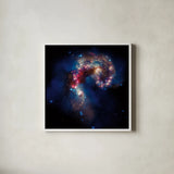Glittering Galaxy by Wild Apple Portfolio. Shown in a crisp white glass frame for a clean and minimalist style. Available as an archival giclee rolled canvas, fine art paper, or poster print. SKU 87125a.