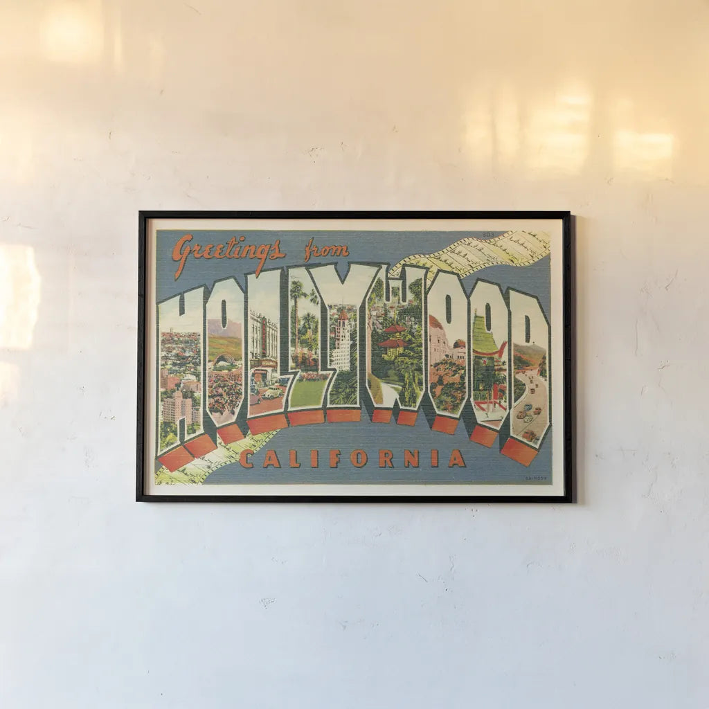 Greetings from Hollywood v2 by Wild Apple Portfolio. shown as a paper print in a black flame. Available as a archival giclee rolled canvas, fine art paper, or poster print. SKU 45240i.