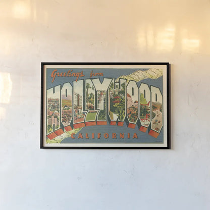 Greetings from Hollywood v2 by Wild Apple Portfolio. shown as a paper print in a black flame. Available as a archival giclee rolled canvas, fine art paper, or poster print. SKU 45240i.