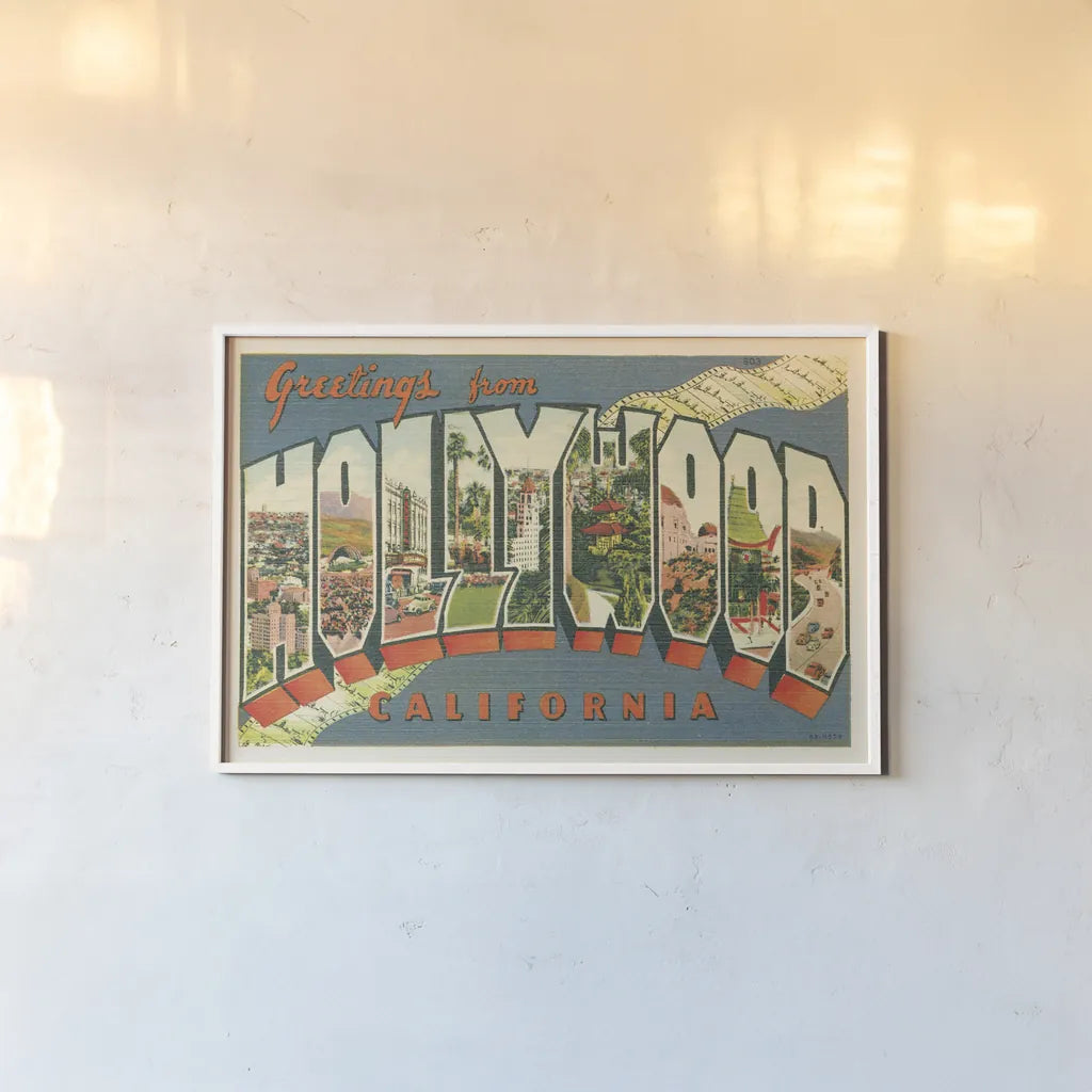 Greetings from Hollywood v2 by Wild Apple Portfolio. shown as a paper print in a white frame. Available as a archival giclee rolled canvas, fine art paper, or poster print. SKU 45240i.