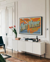 Greetings from New York by Wild Apple Portfolio. shown as a framed stretched canvas in a living room above a console. Available as a archival giclee rolled canvas, fine art paper, or poster print. SKU 45242i.