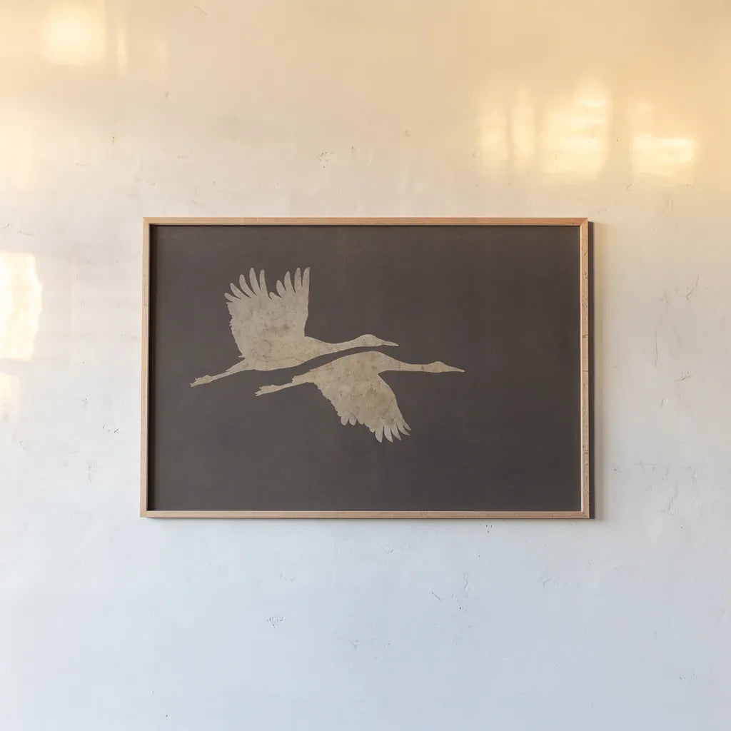 Herons in Flight Mocha by Wild Apple Portfolio. shown as a paper print in a natural frame. Available as a archival giclee rolled canvas, fine art paper, or poster print. SKU 96471i.
