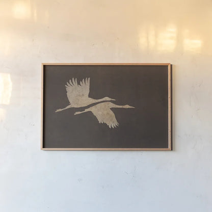 Herons in Flight Mocha by Wild Apple Portfolio. shown as a paper print in a natural frame. Available as a archival giclee rolled canvas, fine art paper, or poster print. SKU 96471i.