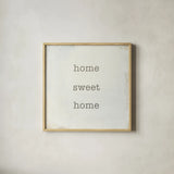 Home Sweet Home I by Wild Apple Portfolio. Shown in a natural wood glass frame for a timeless modern aesthetic. Available as an archival giclee rolled canvas, fine art paper, or poster print. SKU 46894a.