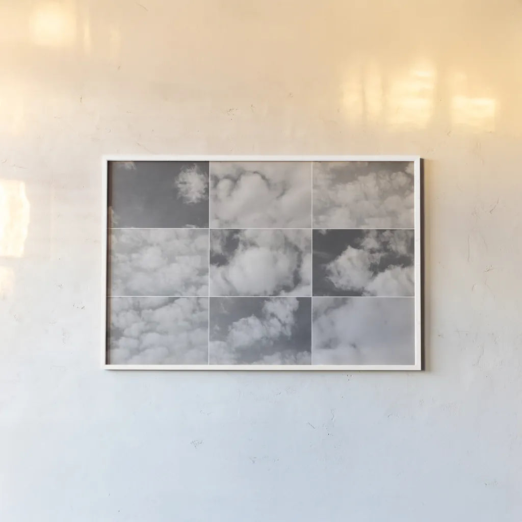 In the Clouds Collage by Wild Apple Portfolio. shown as a paper print in a white frame. Available as a archival giclee rolled canvas, fine art paper, or poster print. SKU 43545i.