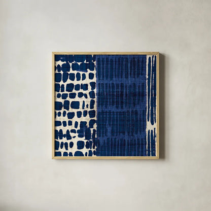 Indigo Batik I by Wild Apple Portfolio. Shown in a natural wood glass frame for a timeless modern aesthetic. Available as an archival giclee rolled canvas, fine art paper, or poster print. SKU 16448a.