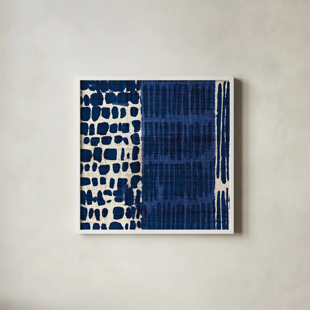Indigo Batik I by Wild Apple Portfolio. Shown in a crisp white glass frame for a clean and minimalist style. Available as an archival giclee rolled canvas, fine art paper, or poster print. SKU 16448a.