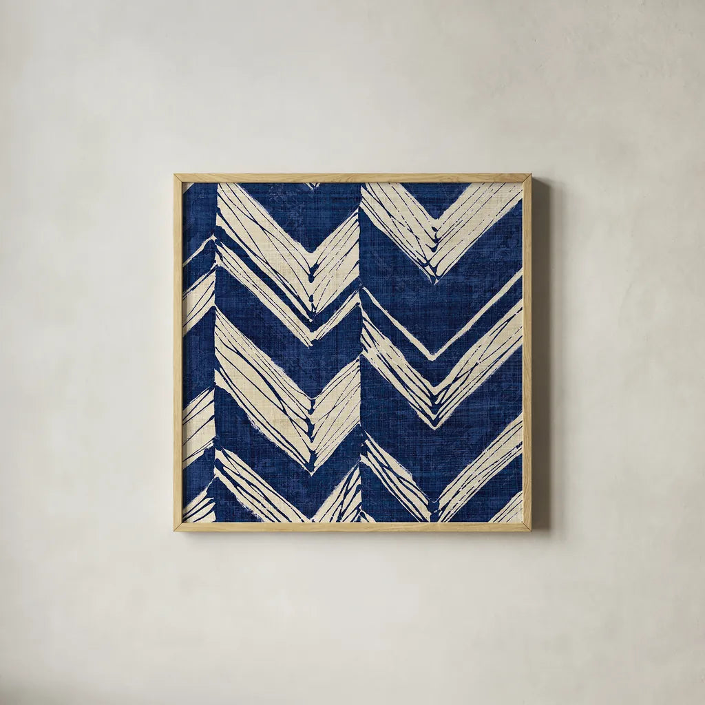 Indigo Batik II by Wild Apple Portfolio. Shown in a natural wood glass frame for a timeless modern aesthetic. Available as an archival giclee rolled canvas, fine art paper, or poster print. SKU 16449a.