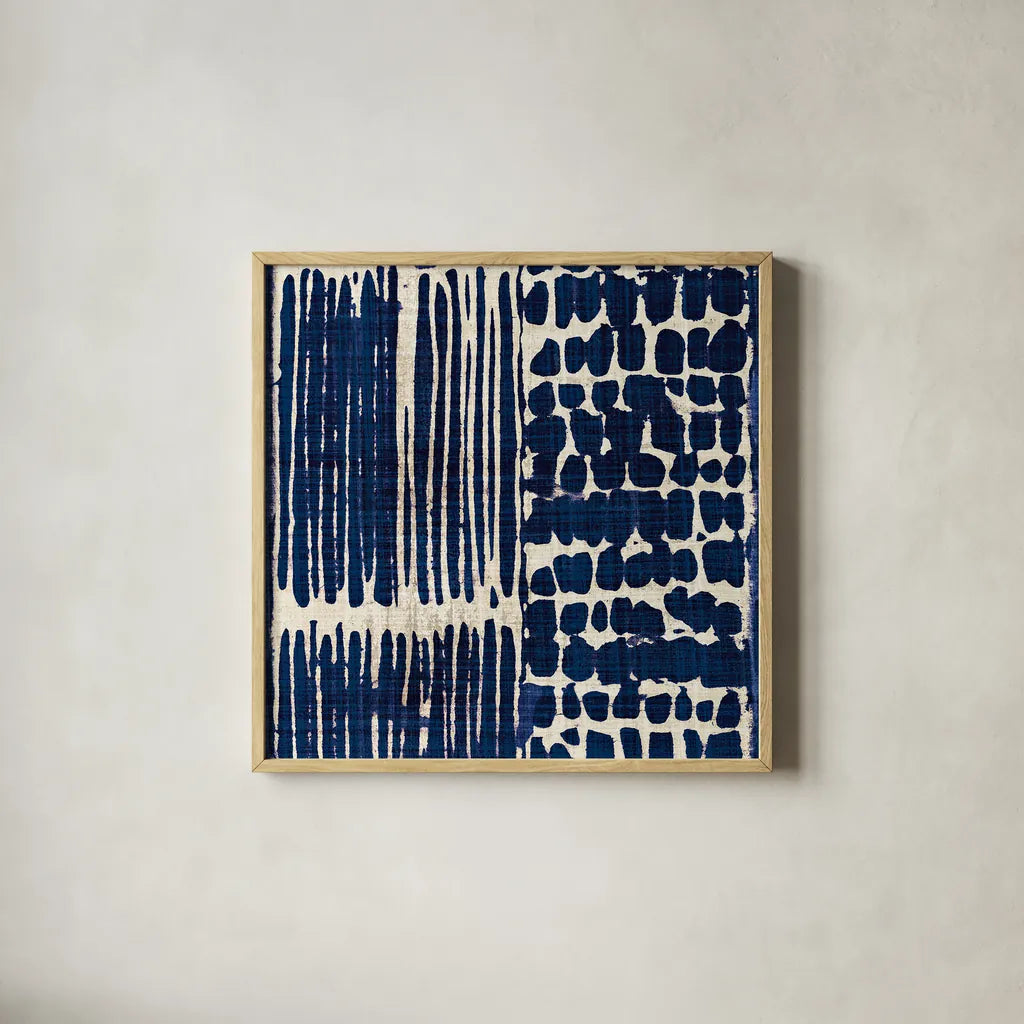 Indigo Batik III by Wild Apple Portfolio. Shown in a natural wood glass frame for a timeless modern aesthetic. Available as an archival giclee rolled canvas, fine art paper, or poster print. SKU 16450a.