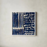 Indigo Batik III by Wild Apple Portfolio. Shown in a crisp white glass frame for a clean and minimalist style. Available as an archival giclee rolled canvas, fine art paper, or poster print. SKU 16450a.
