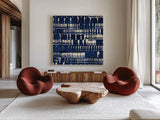 Indigo Batik IV by Wild Apple Portfolio. Shown as extra-large giant wall art in a modern living room. Available as an archival giclee rolled canvas, fine art paper, or poster print. SKU 16451a.