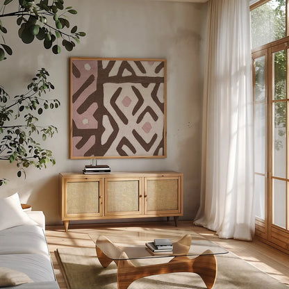 Kuba Cloth I Sq I Pink and White by Wild Apple Portfolio. Shown in a natural wood frame in a cozy modern living room. Available as an archival giclee rolled canvas, fine art paper, or poster print. SKU 82337a.
